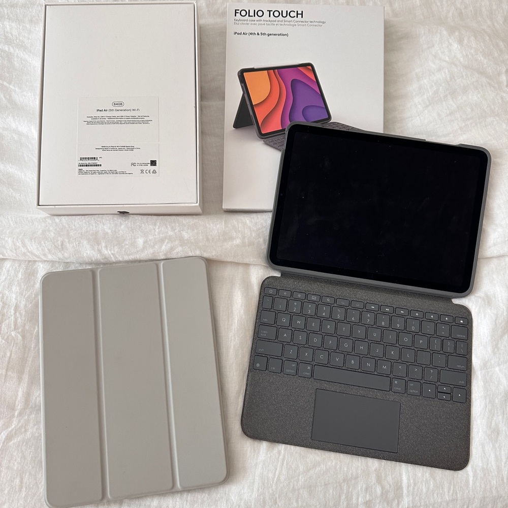 iPad Air 5th generation with folio touch keyboard and extra case